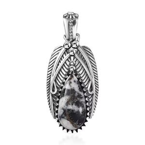 White Buffalo bezel set in an oxidized Sterling Silver Feather